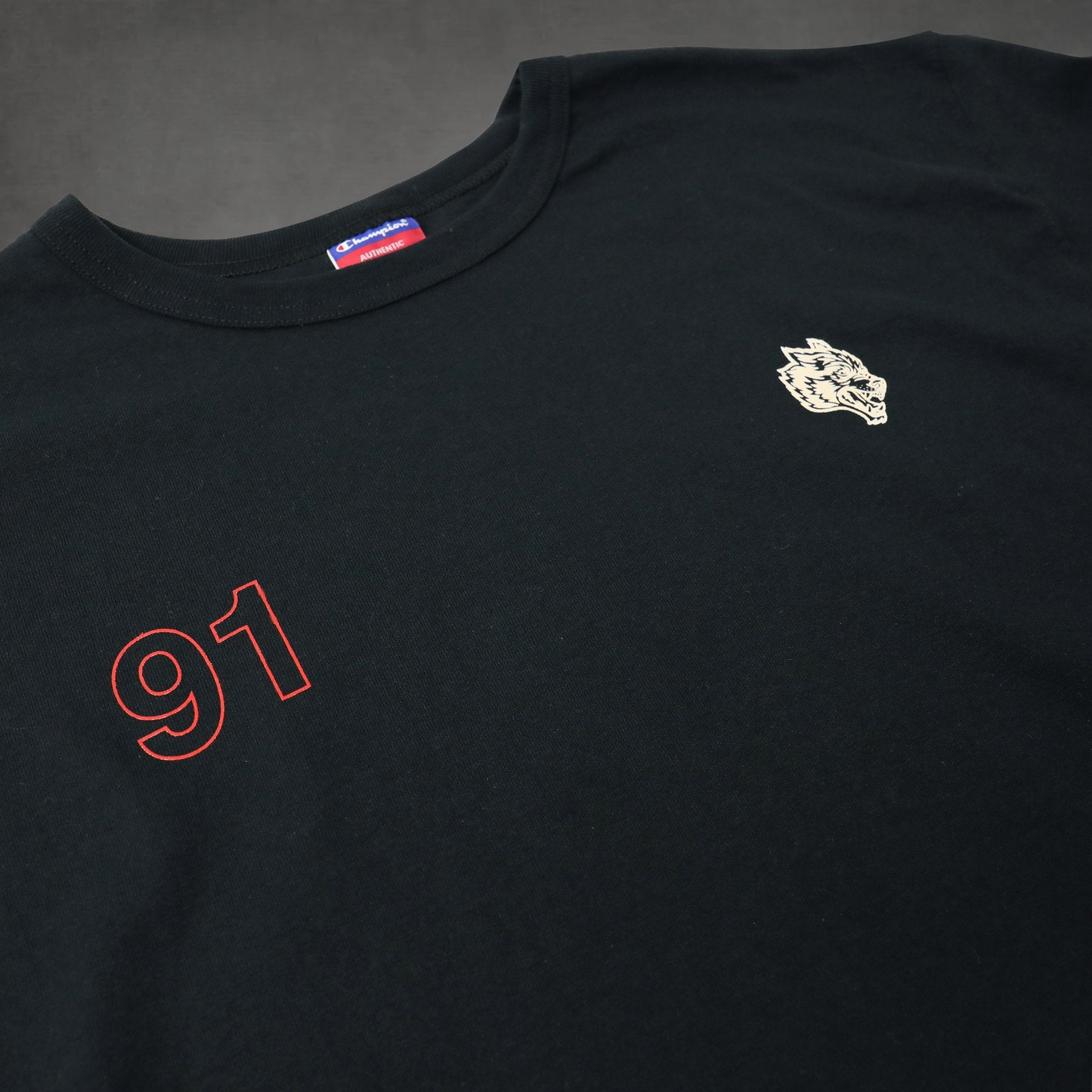 GREATNESS (91) CHAMPION TEE IN BLACK