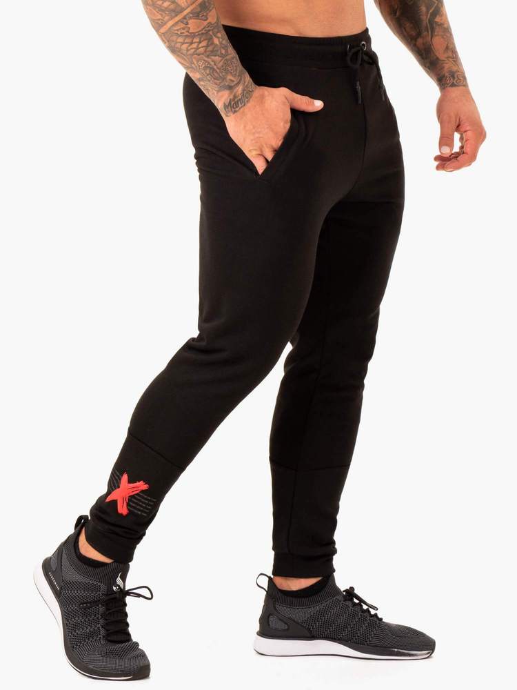 RWXKG TRACK PANTS BLACK