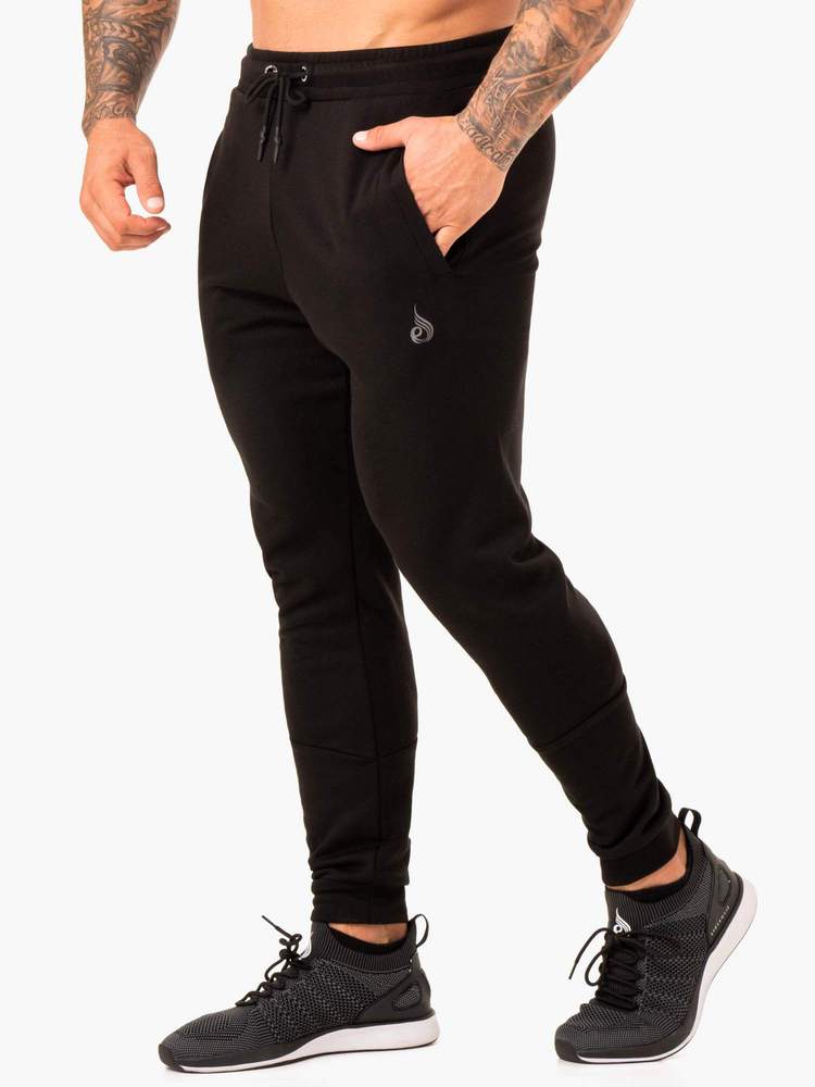 RWXKG TRACK PANTS BLACK