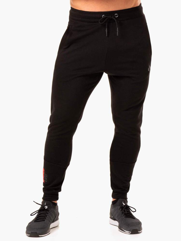 RWXKG TRACK PANTS BLACK